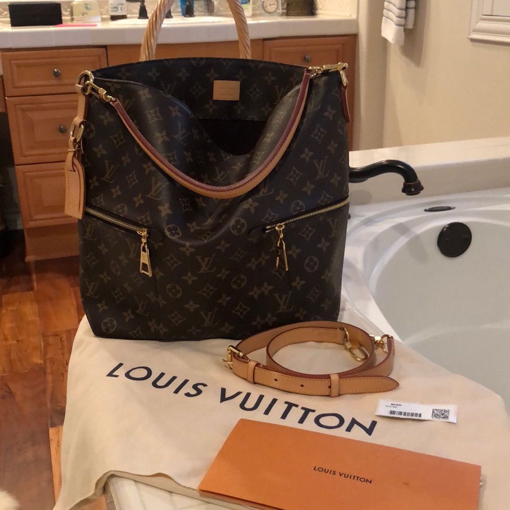 Authentic Louis Vuitton Melie bag